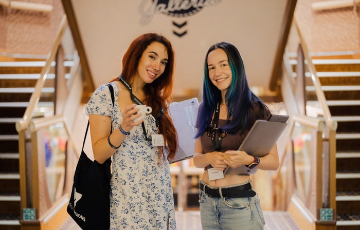 Group of digital nomads coworking on the ship deck